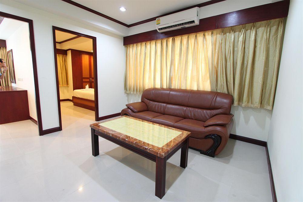 Miloft Sathorn Hotel - Sha Plus Certified Bangkok Exterior photo A living room in a condominium