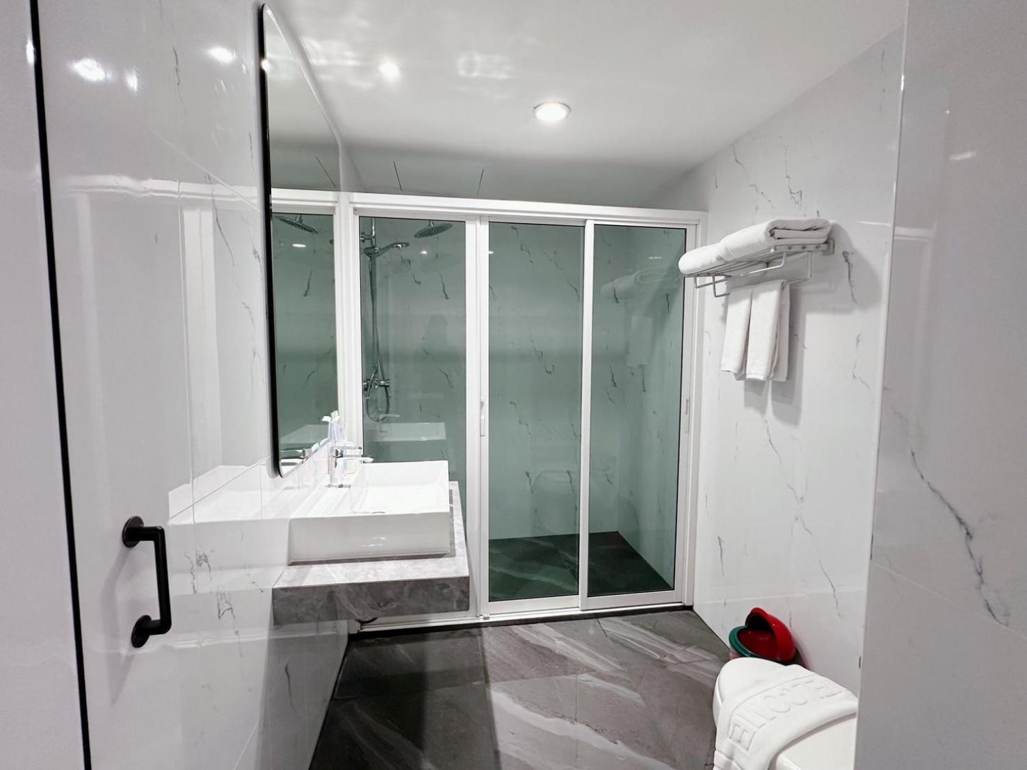 Miloft Sathorn Hotel - Sha Plus Certified Bangkok Exterior photo A shower cubicle